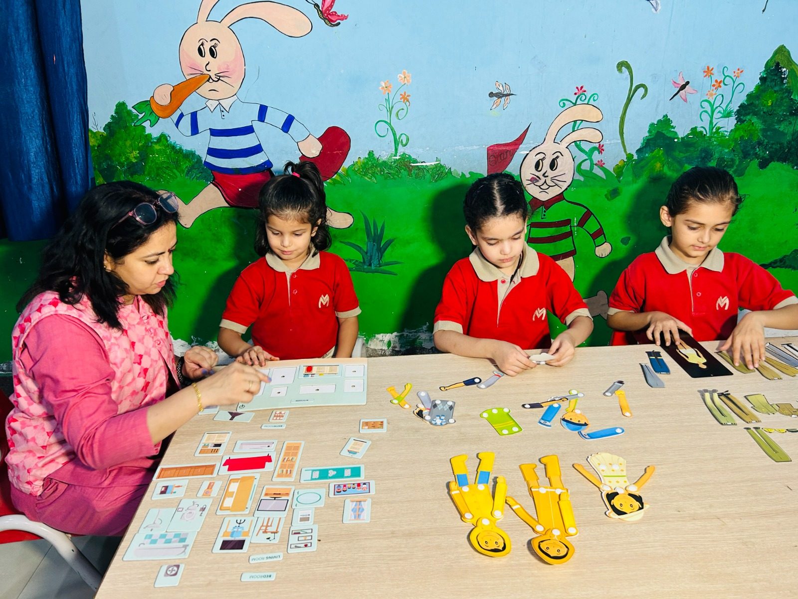 A teacher guiding students through a lesson in a VMPS classroom