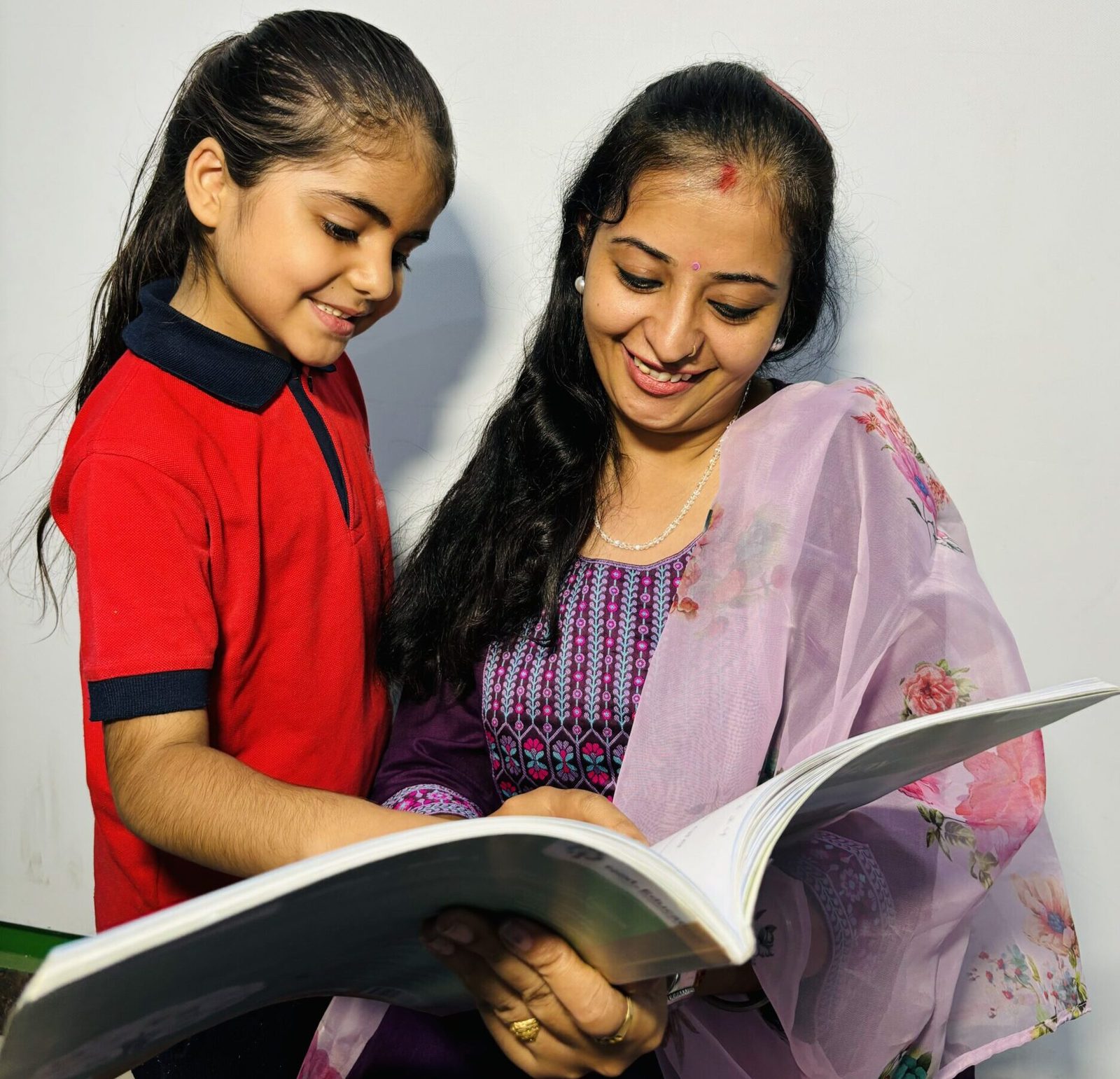 A teacher guiding students through an activity at Vidya Mandir Public School